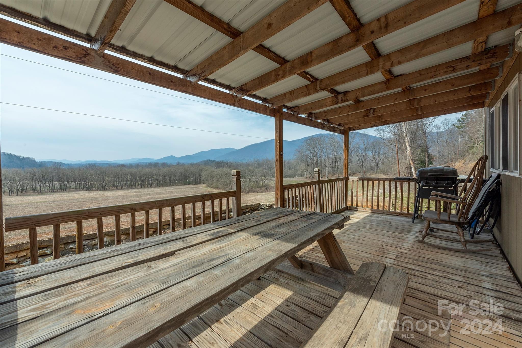 4125 Old Greenlee Road Marion, NC 28752 - Photo 44 of 48 a view of balcony with wooden floor