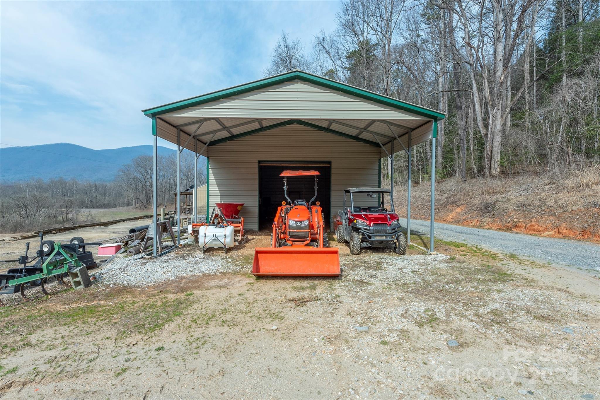 4125 Old Greenlee Road Marion, NC 28752 - Photo 47 of 48 a front view of a house with garden