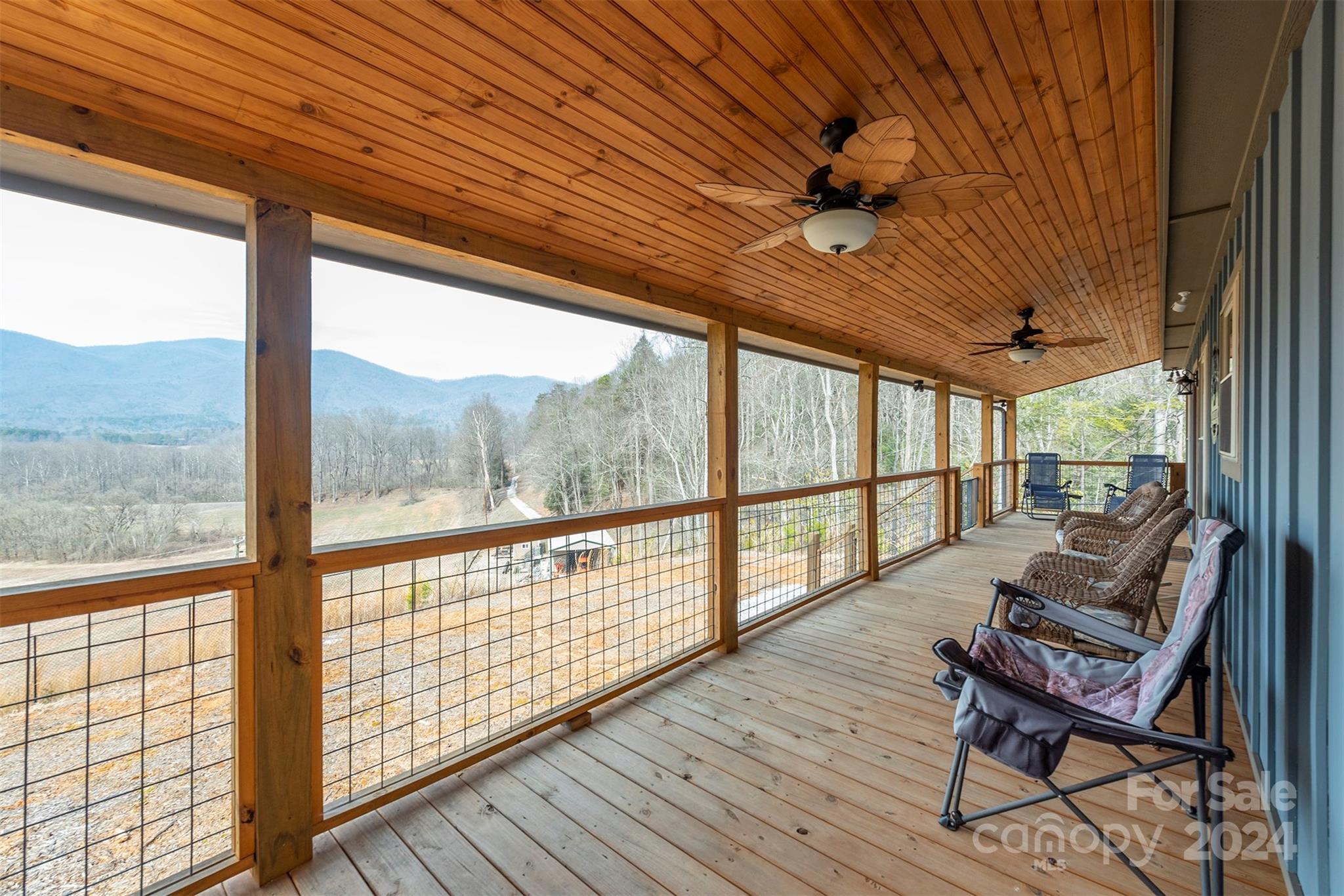 4125 Old Greenlee Road Marion, NC 28752 - Photo 10 of 48 a view of deck with furniture and wooden floor