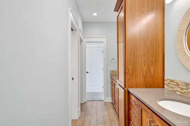 a view of a balcony with wooden floor