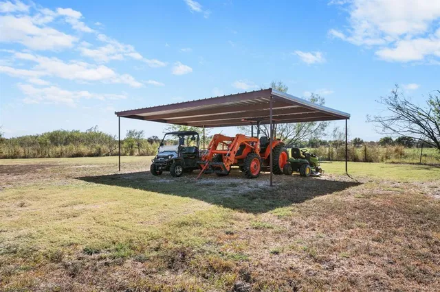a view of a outdoor space with swimming pool