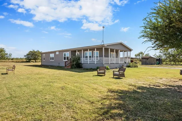 a swimming pool view with a lake view