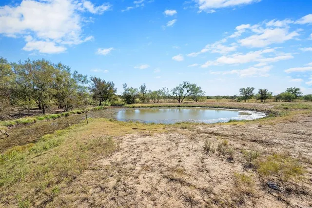 a view of an ocean and city