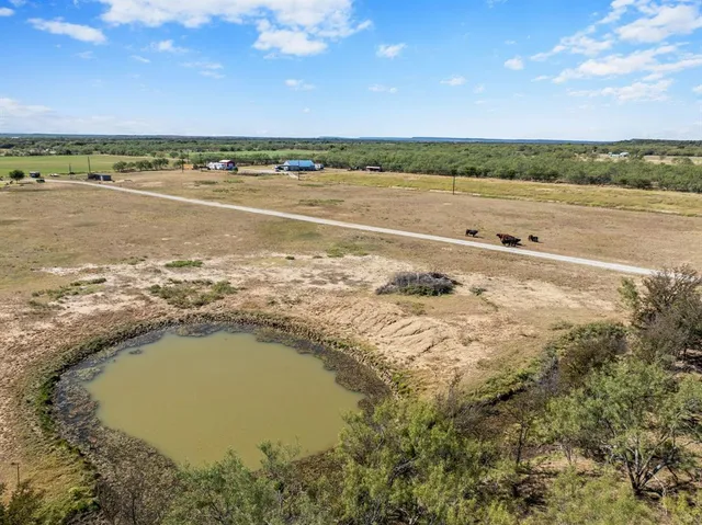 a view of a swimming pool and an ocean view