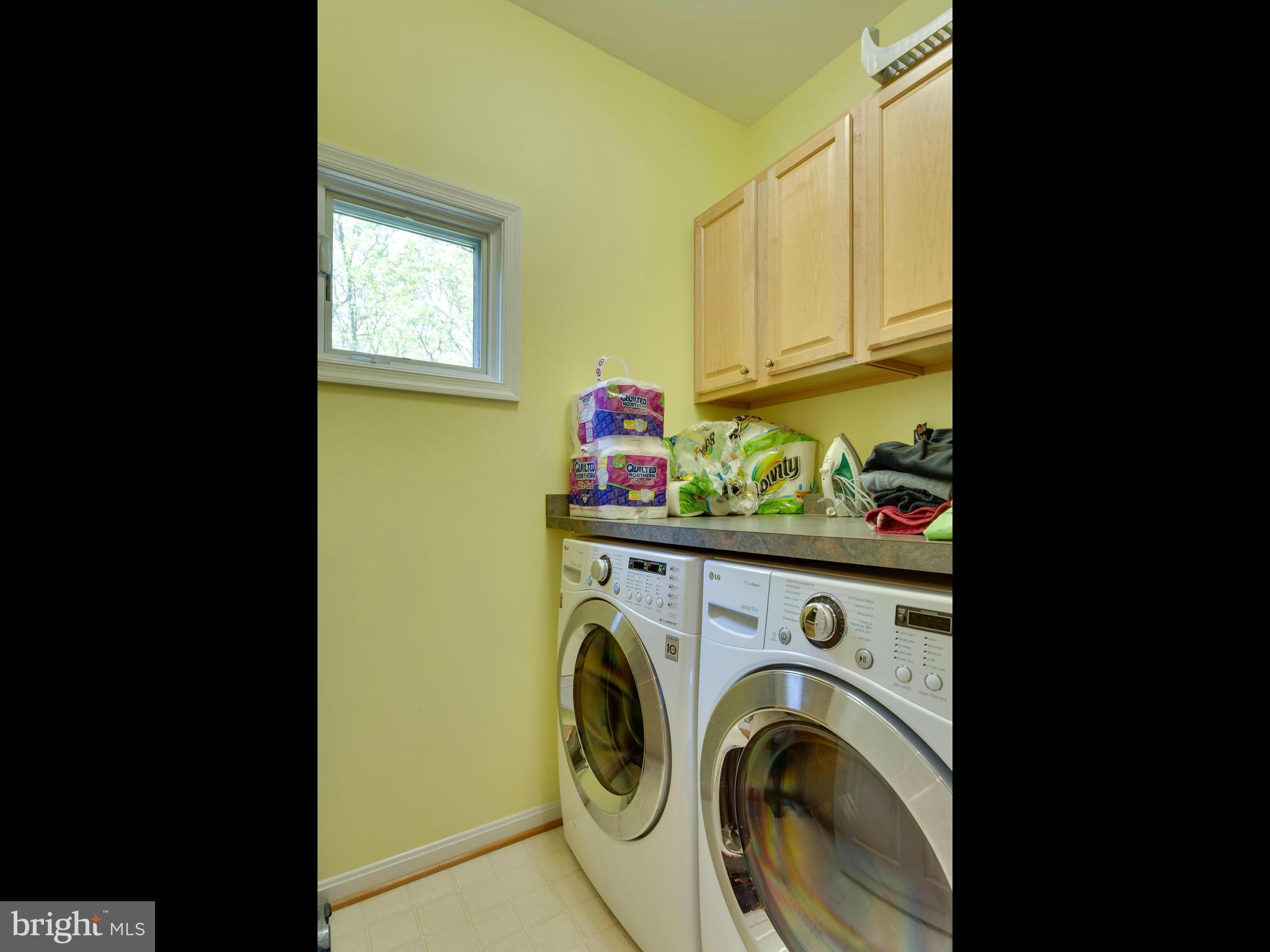 2000 Beacon Place Reston, VA 20191 - Photo 21 of 30 Front load w/d with sink in main level laundry