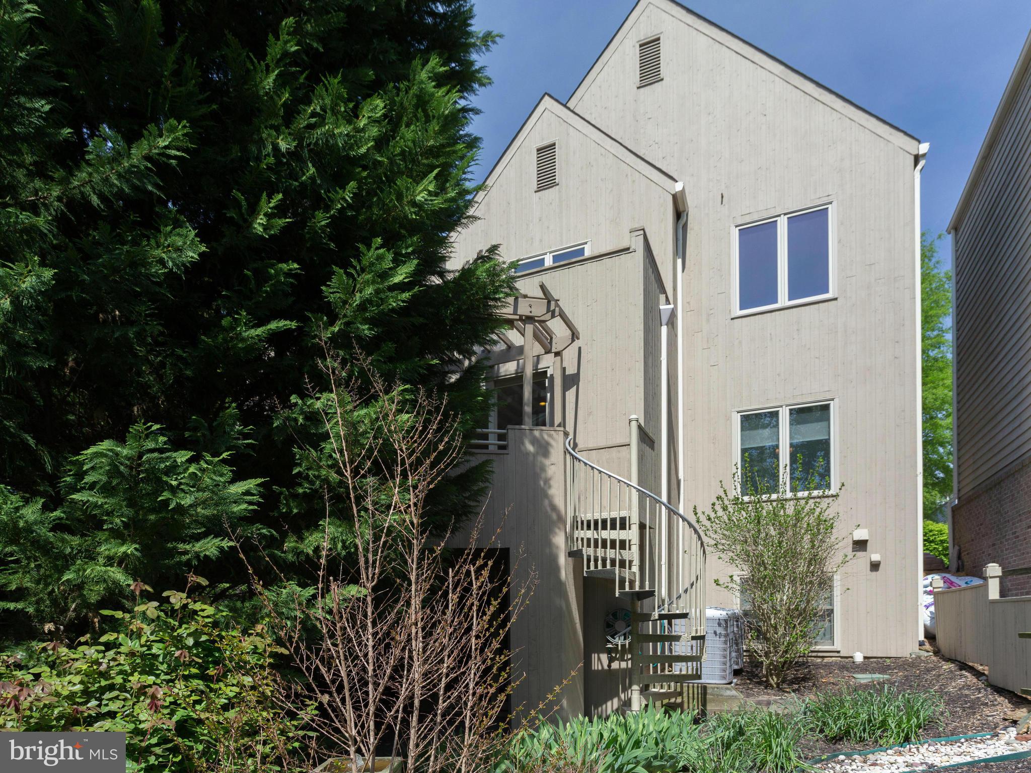 2000 Beacon Place Reston, VA 20191 - Photo 25 of 30 Spiral staircase from patio to deck