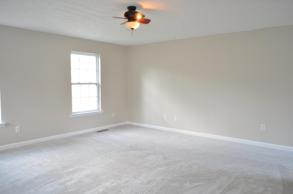 142 Old Indian Springs Road Forsyth, GA 31029 - Photo 20 of 30 an empty room with a window