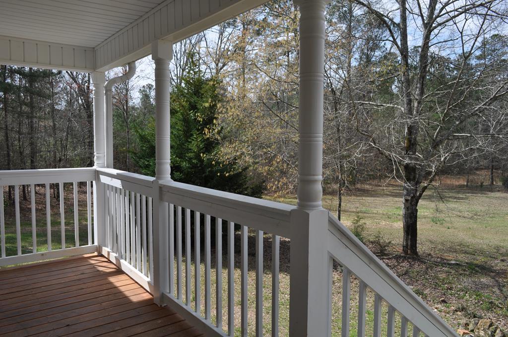 142 Old Indian Springs Road Forsyth, GA 31029 - Photo 3 of 30 a view of a balcony with yard