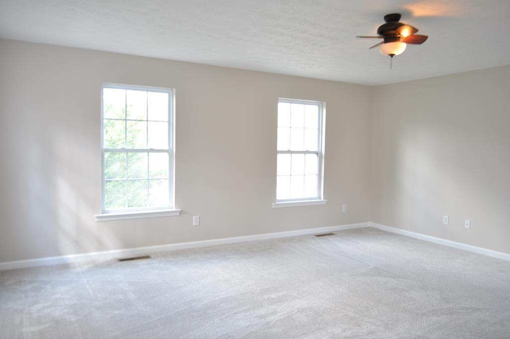 142 Old Indian Springs Road Forsyth, GA 31029 - Photo 21 of 30 an empty room with a window
