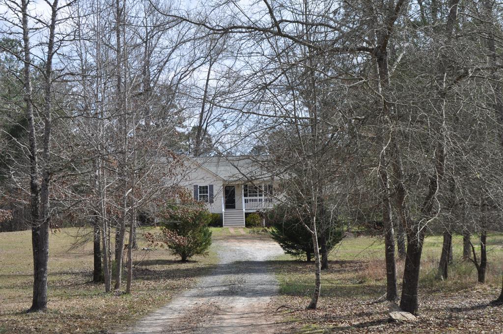 142 Old Indian Springs Road Forsyth, GA 31029 - Photo 28 of 30 a front view of a house with trees