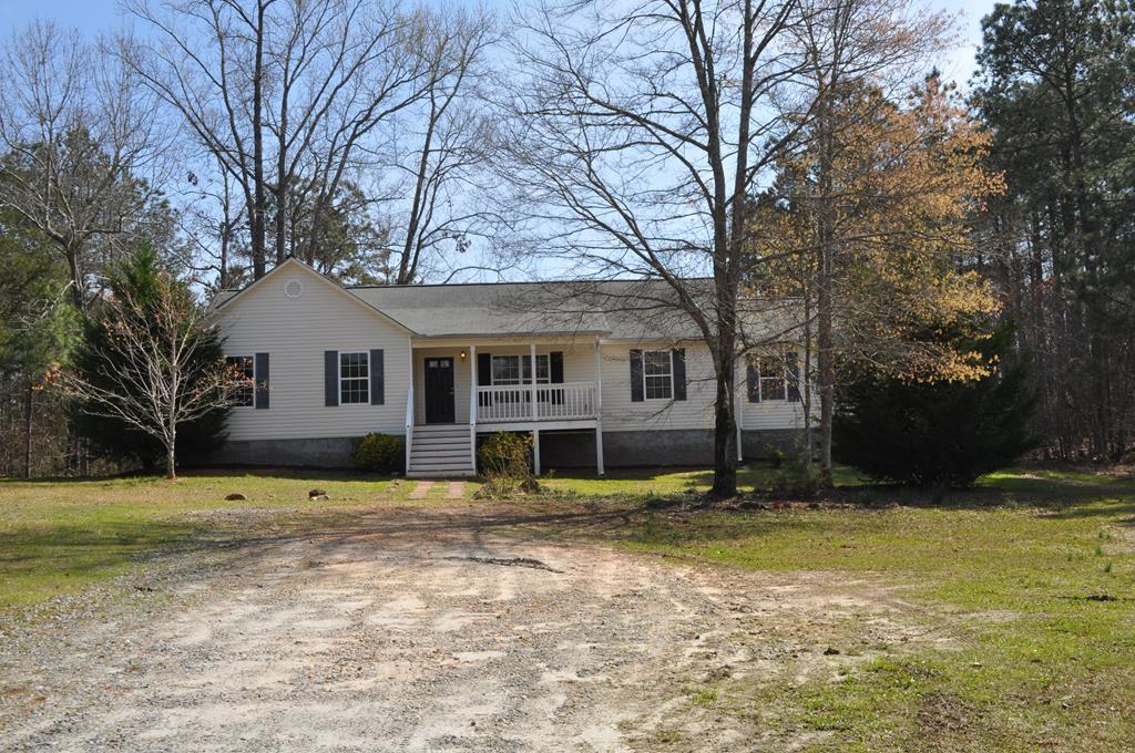 142 Old Indian Springs Road Forsyth, GA 31029 - Photo 29 of 30 a view of a house with a yard