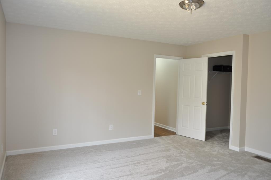 142 Old Indian Springs Road Forsyth, GA 31029 - Photo 8 of 30 a view of an empty room with closet and a window