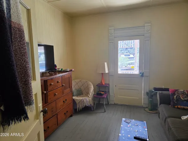 a bathroom with a sink a mirror and window