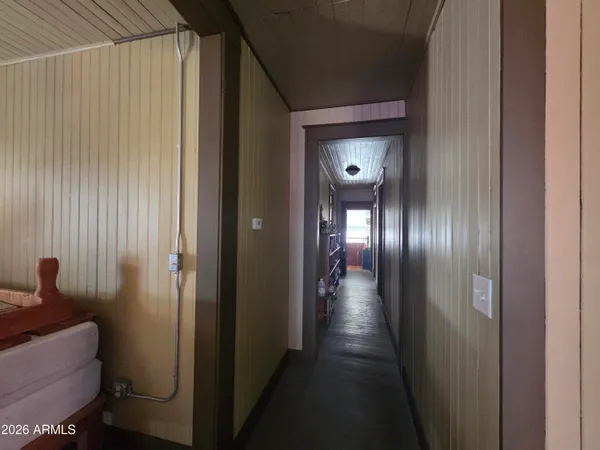 a view of a brick building with many windows