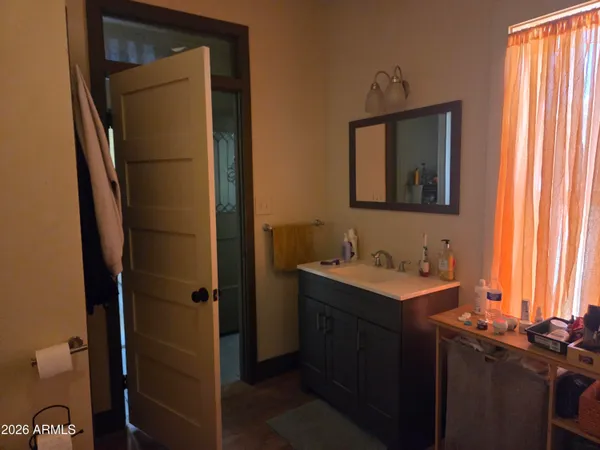 a living room with lots of furniture and a gym equipment