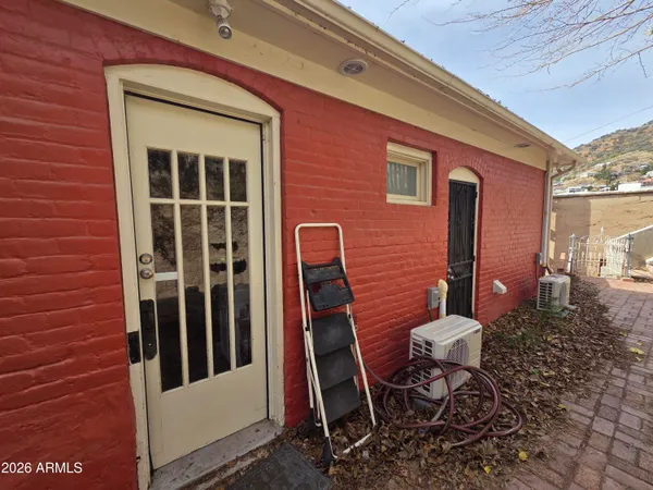 a kitchen with stainless steel appliances granite countertop a refrigerator stove and microwave