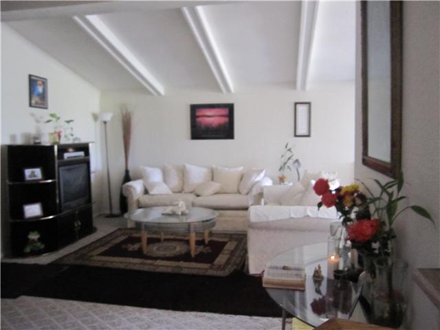 Living room with lots a natural lights!