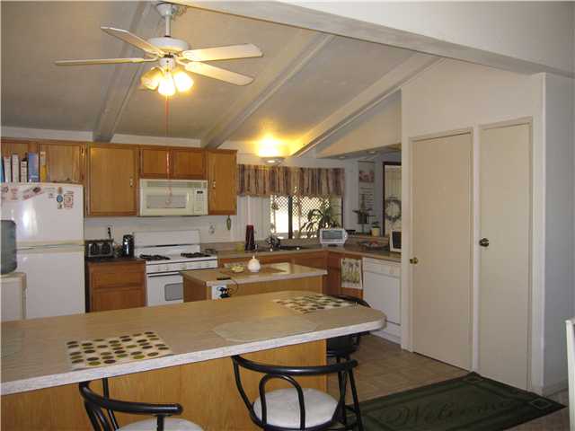 Kitchen has pantry closet and storage closet.