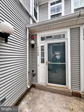 a view of a house with window and a door
