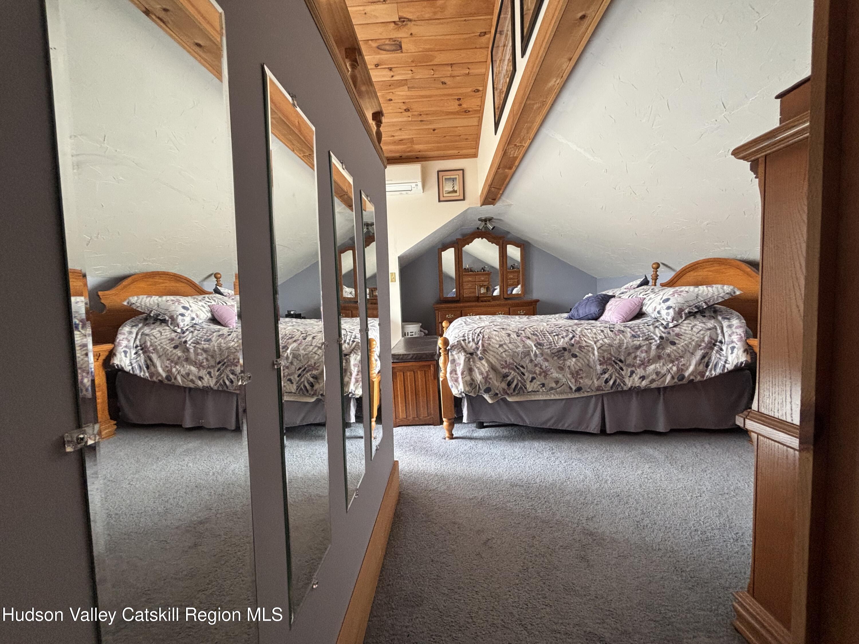 6 Maple Street Catskill, NY 12414 - Photo 15 of 20 a bedroom with bed and a window