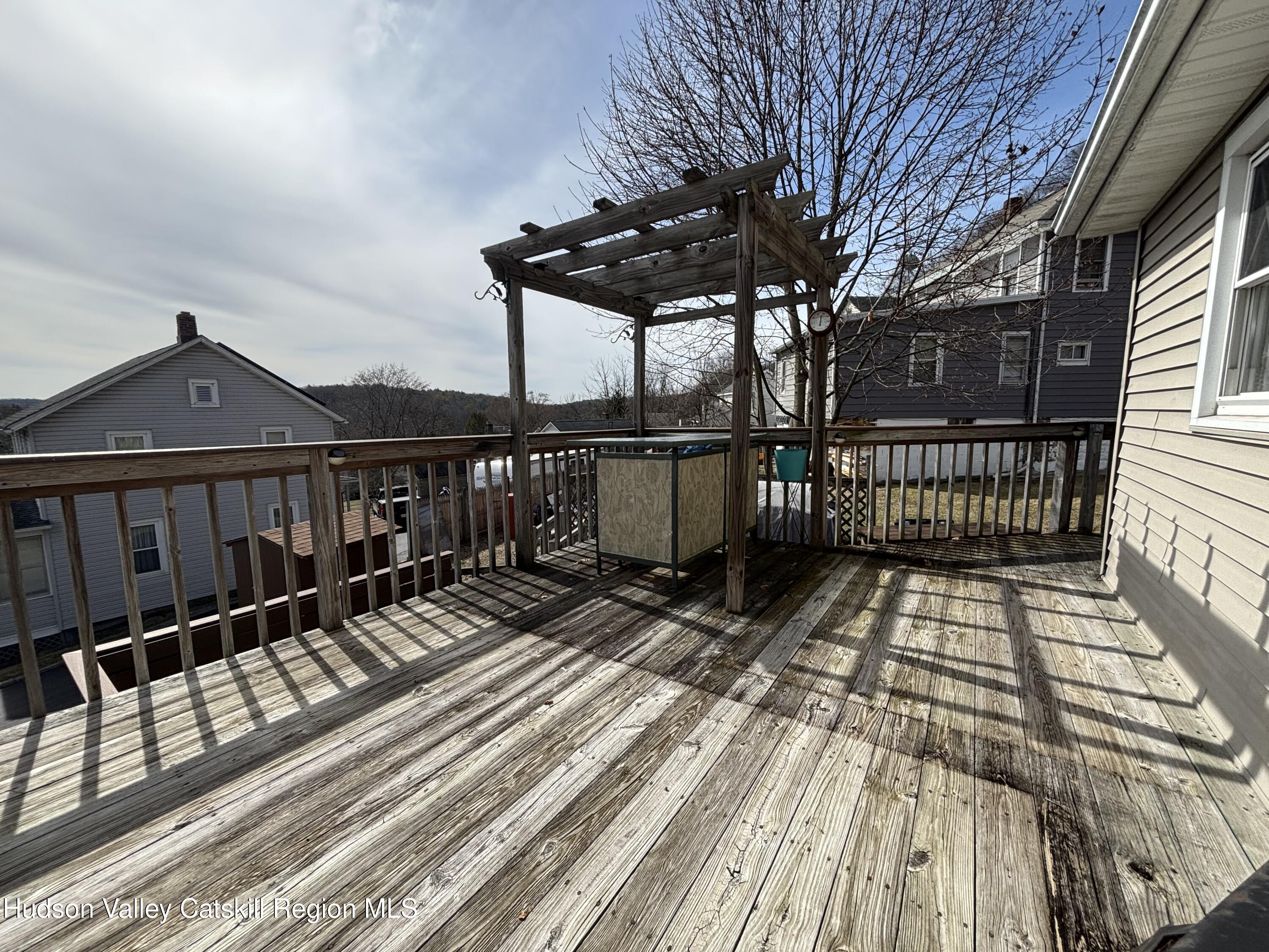 6 Maple Street Catskill, NY 12414 - Photo 20 of 20 a view of a brick house with a large window