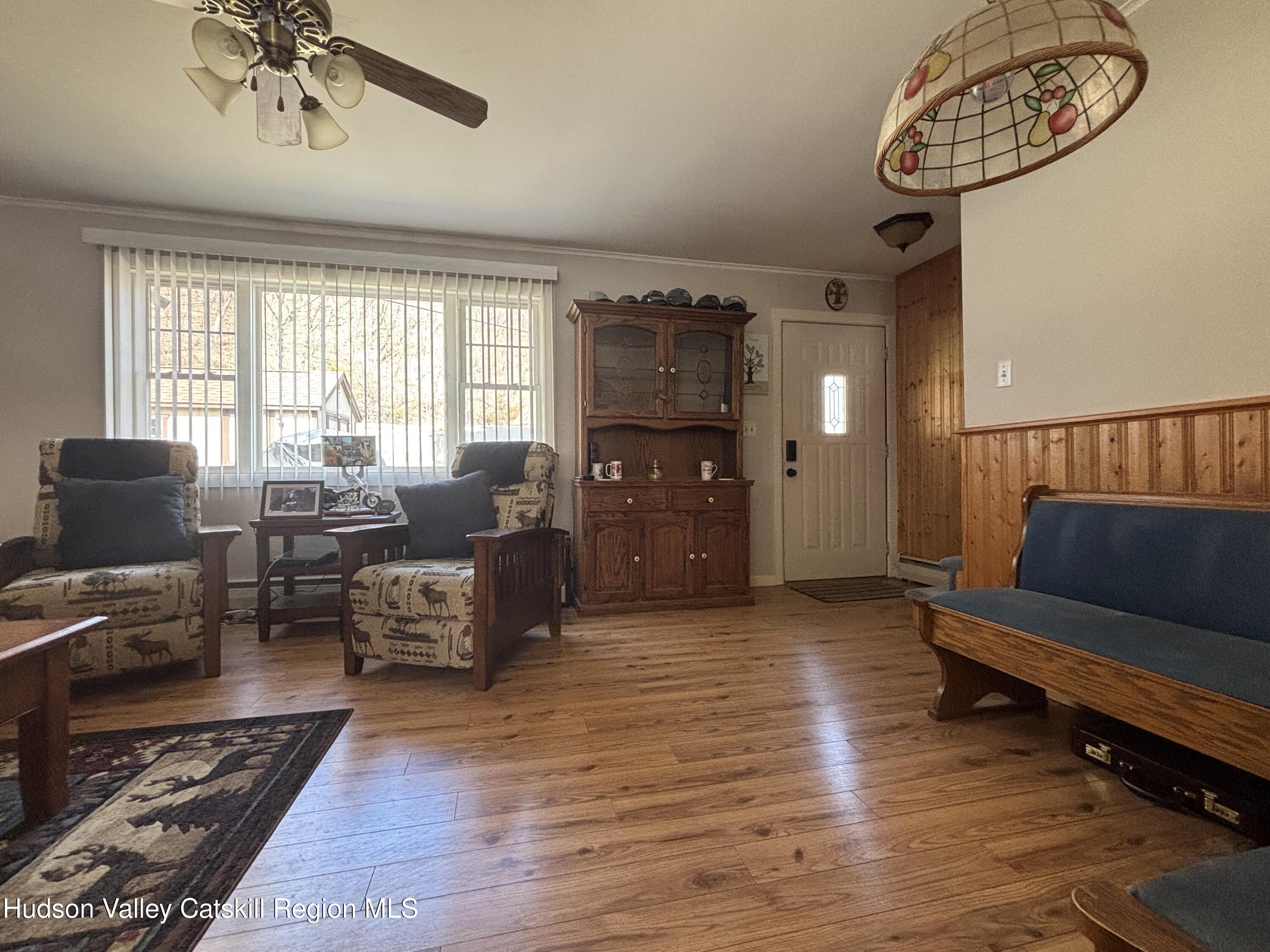 6 Maple Street Catskill, NY 12414 - Photo 7 of 20 a living room with furniture and wooden floor