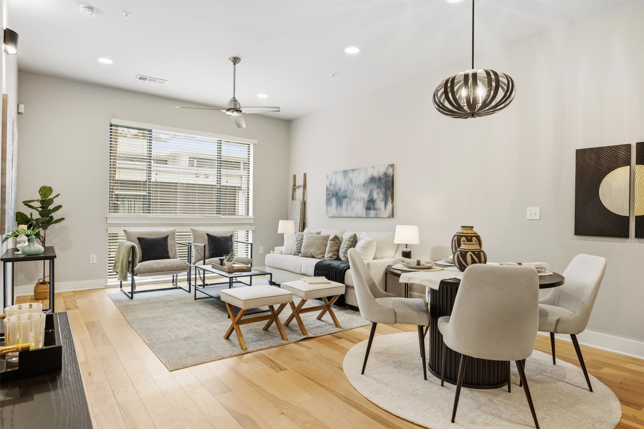 2314 Enfield Road, Unit 203 Austin, TX 78703 - Photo 13 of 37 A sleek ceiling fan and recessed lighting keep the space comfortable year-round.