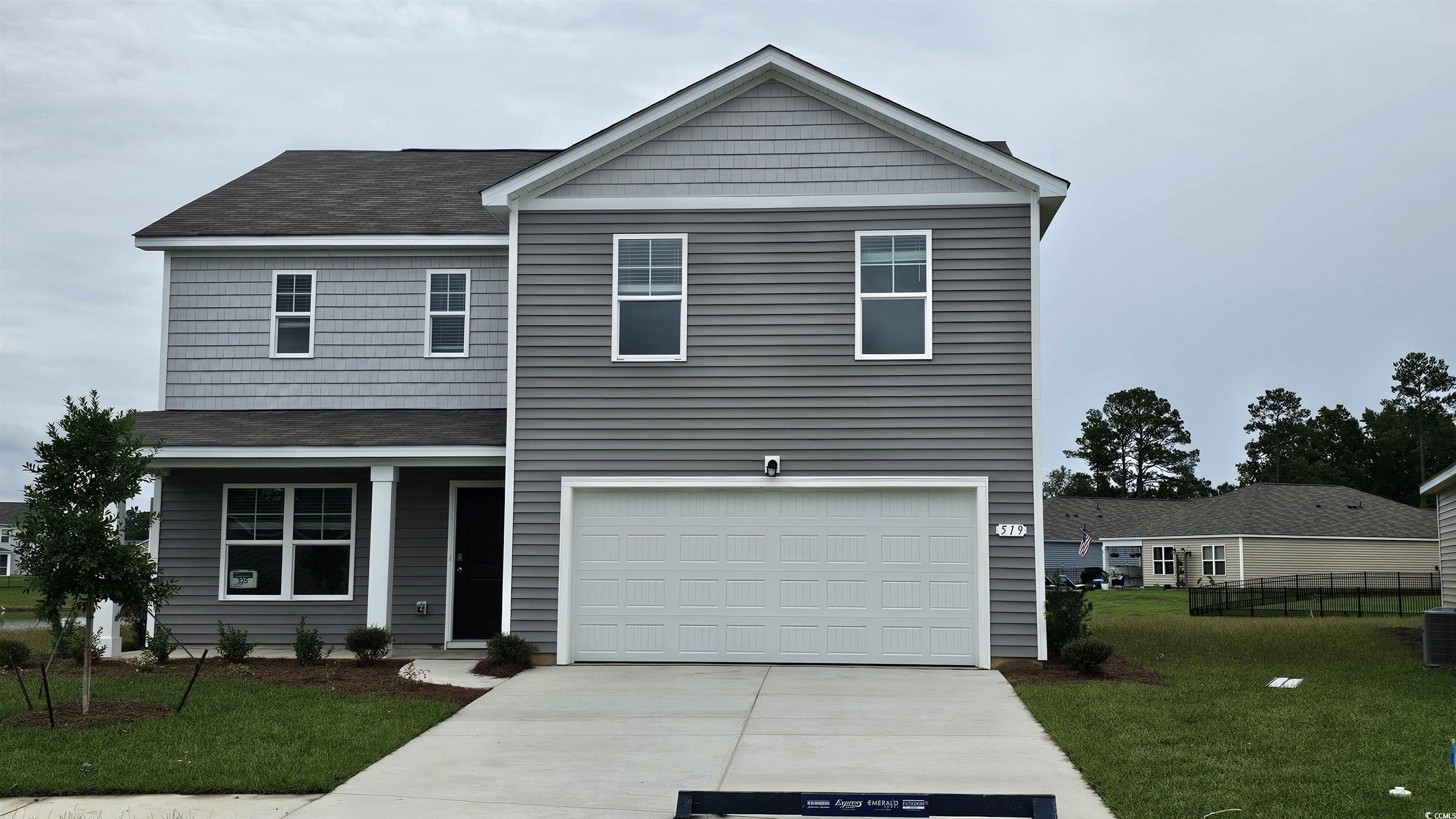 View of front of house with central air condition