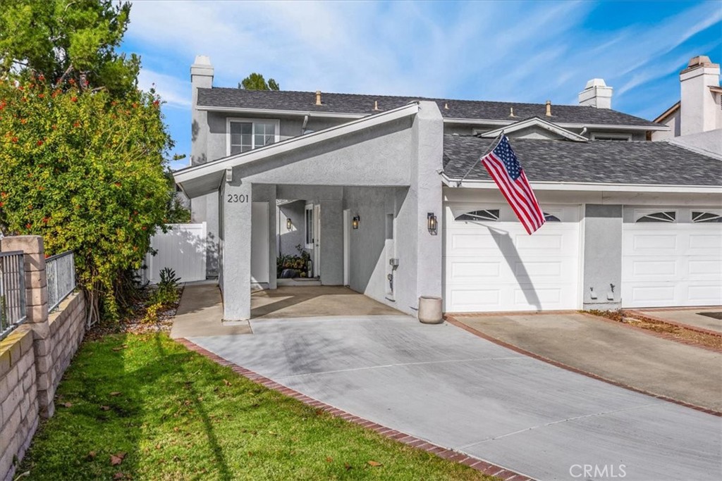 2301 Raintree Drive Brea, CA 92821 - Photo 1 of 1 a front view of a house with a yard