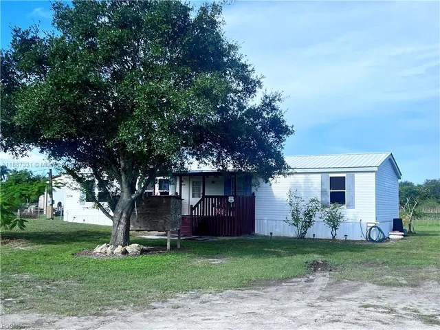 front view of house with a yard