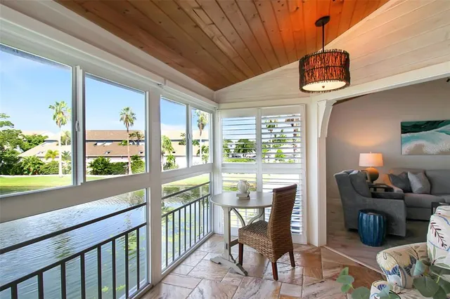 a view of a livingroom with furniture and window