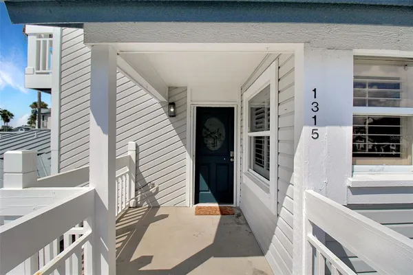 a view of a back yard of the house