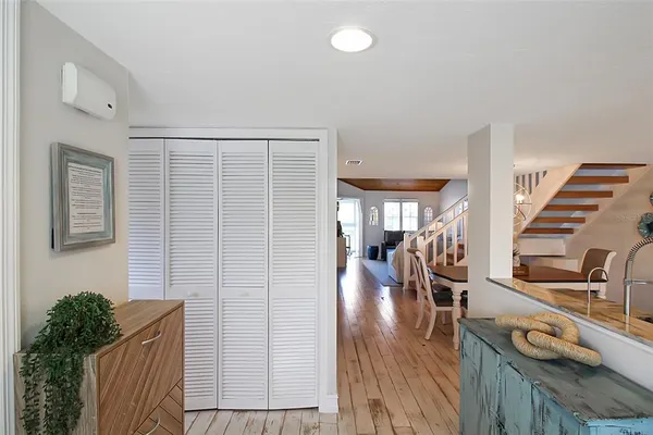 a view of a living room and hardwood floor
