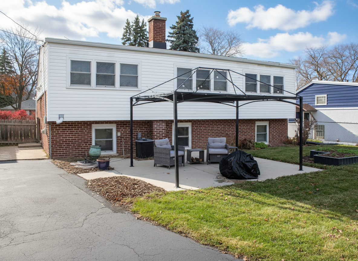 305 Maple Street Glen Ellyn, IL 60137 - Photo 26 of 28 a view of a house with a yard and sitting area