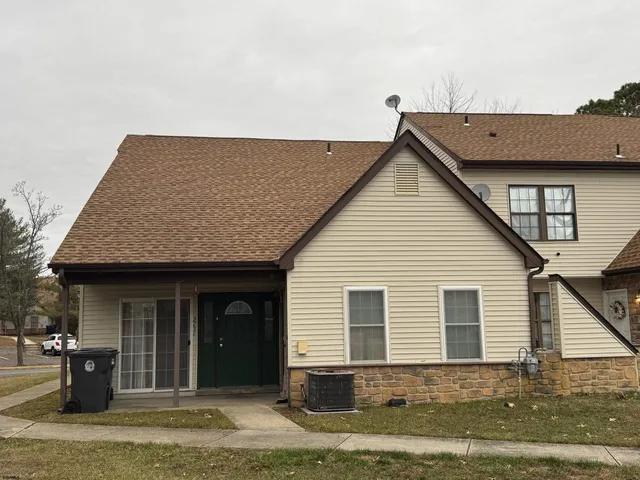 a view of a house with a patio