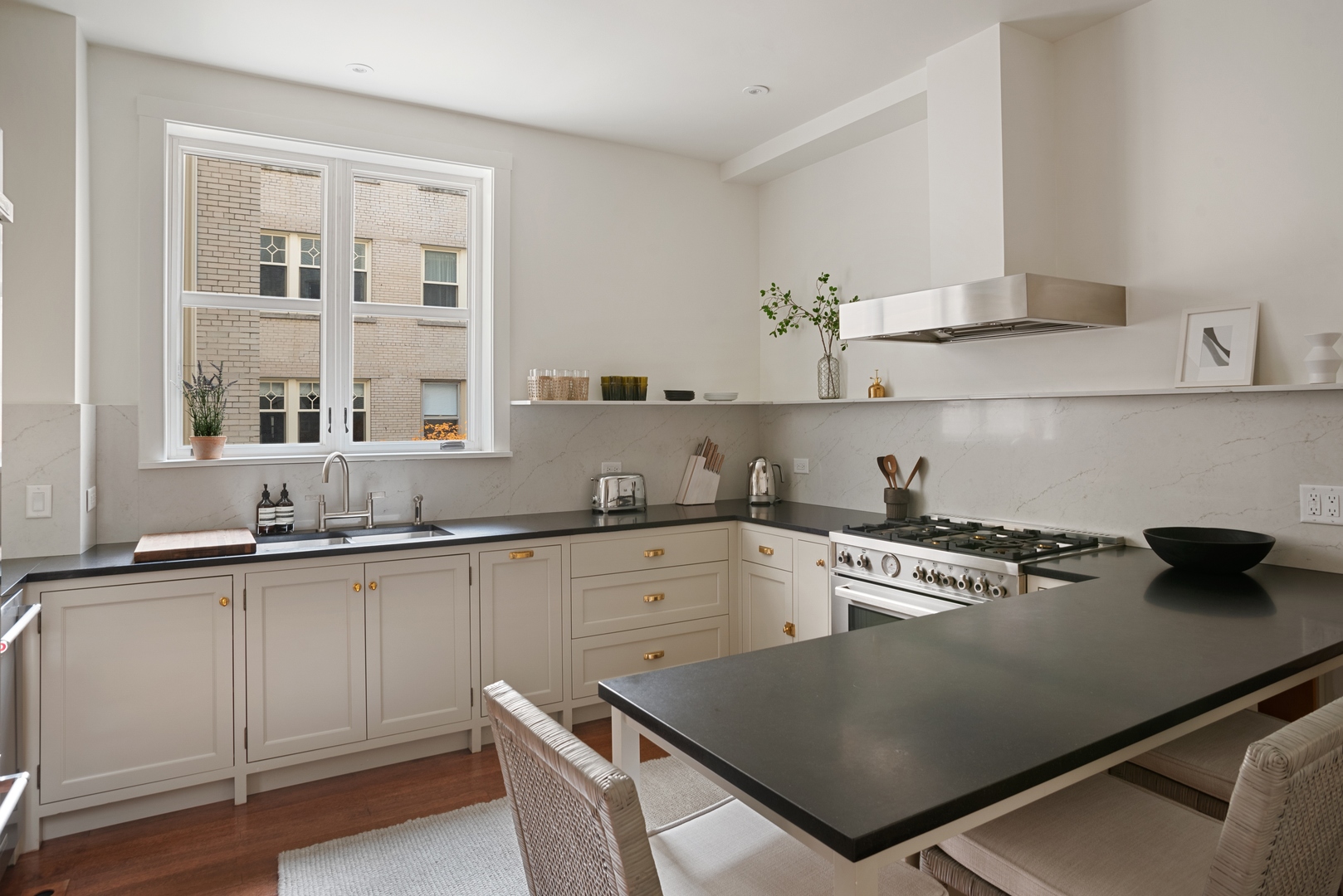 322 West Belden Avenue, Unit 1W Chicago, IL 60614 - Photo 11 of 24 a kitchen with a cabinets and white appliances