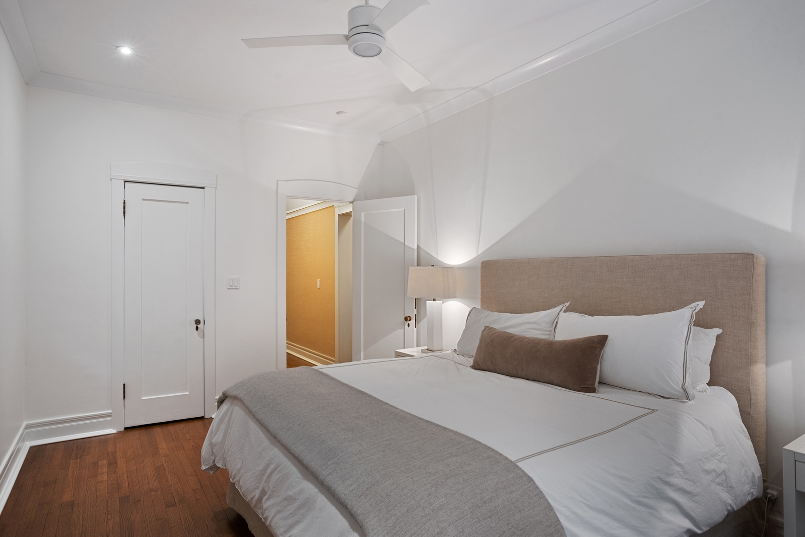 322 West Belden Avenue, Unit 1W Chicago, IL 60614 - Photo 16 of 24 a bedroom with a bed and a night stand