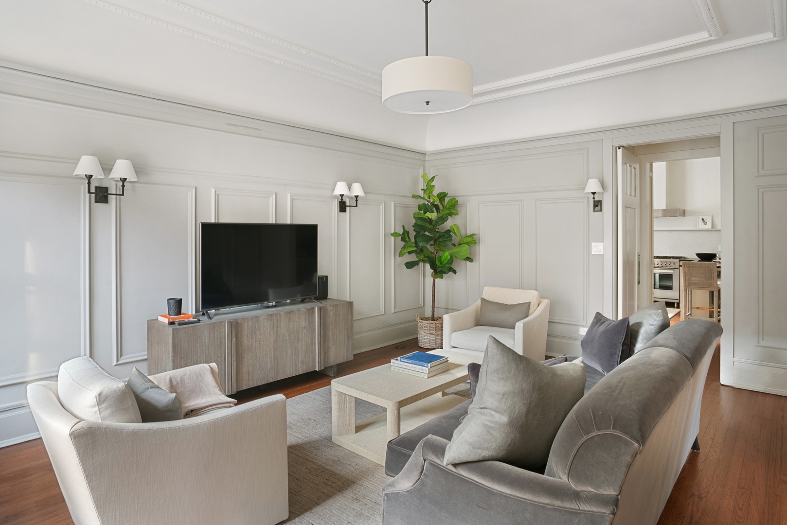 322 West Belden Avenue, Unit 1W Chicago, IL 60614 - Photo 6 of 24 a living room with furniture and a flat screen tv