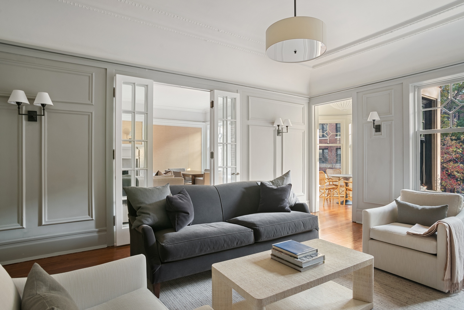 322 West Belden Avenue, Unit 1W Chicago, IL 60614 - Photo 7 of 24 a living room with furniture and a large window