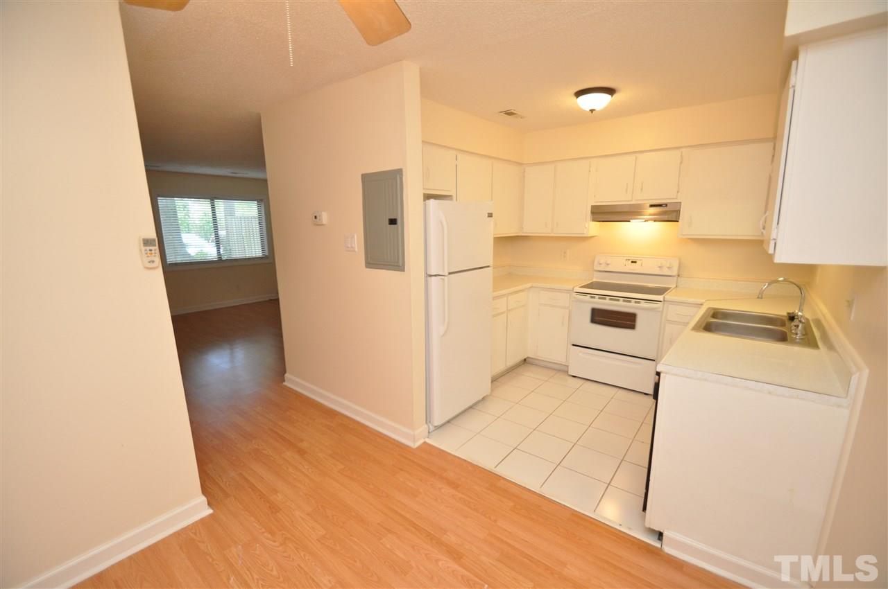 4341 Lake Ridge Drive Raleigh, NC 27604 - Photo 8 of 16 a utility room with cabinets washer and dryer