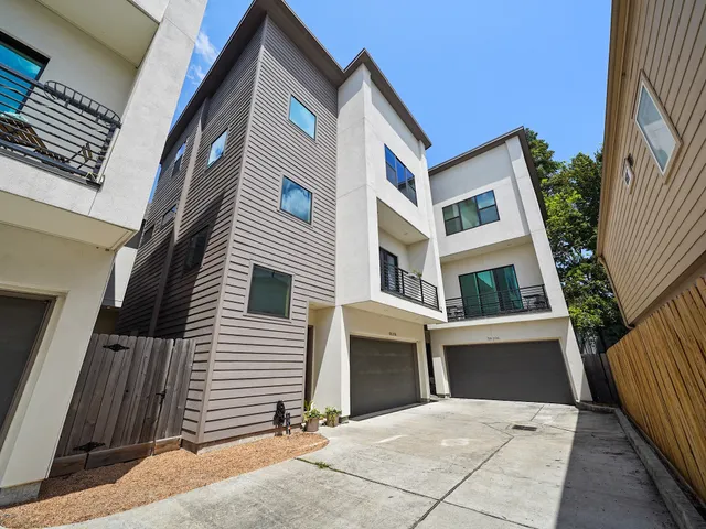 a front view of a house with yard