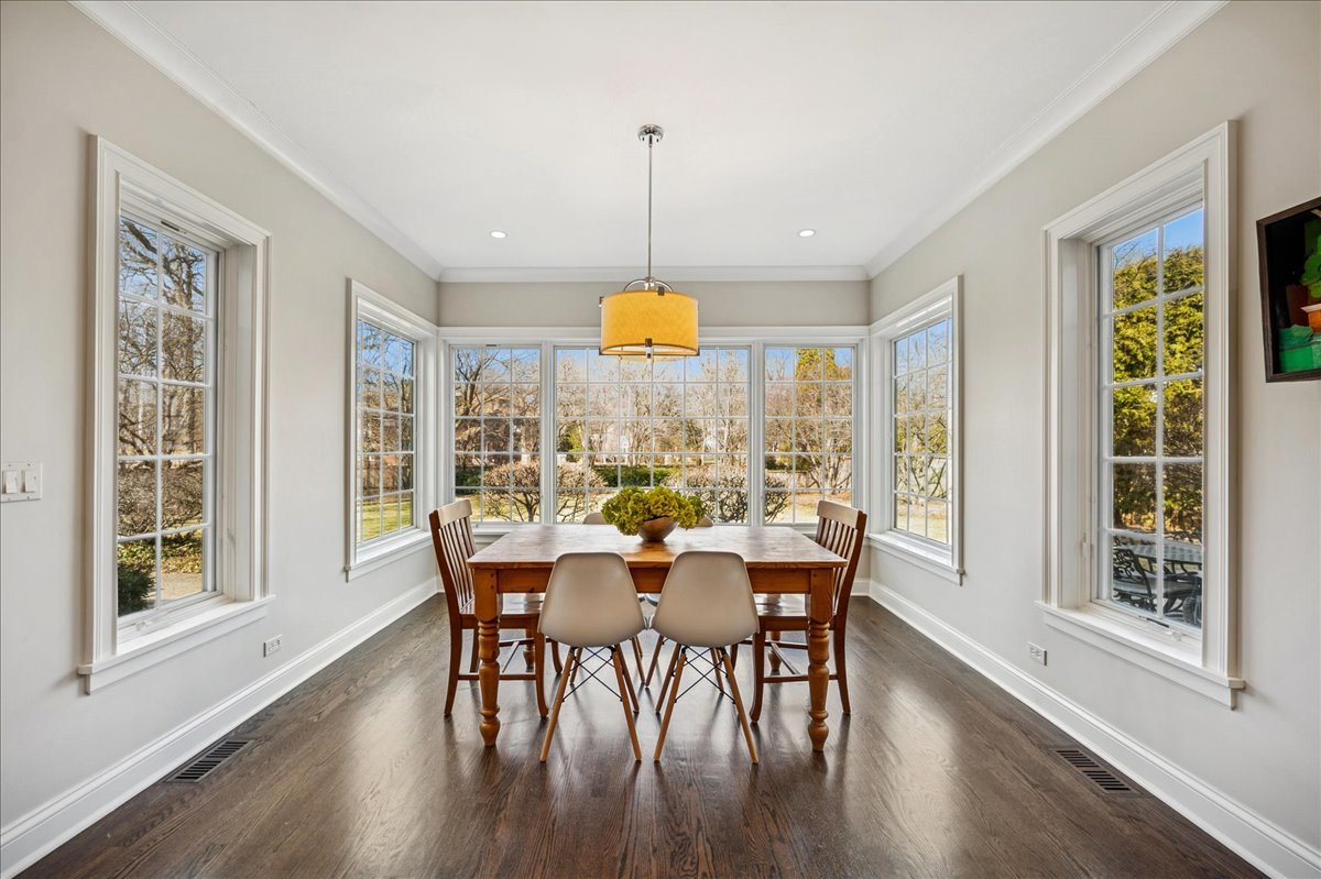 Undisclosed Address Winnetka, IL 60093 - Photo 15 of 55 a dining room with furniture window wooden floor