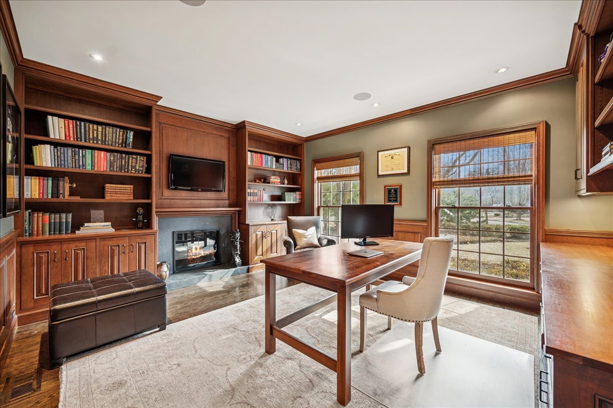 Undisclosed Address Winnetka, IL 60093 - Photo 27 of 55 a workspace with furniture bookshelf and a window