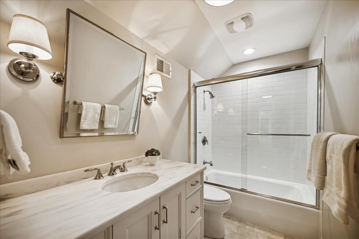 Undisclosed Address Winnetka, IL 60093 - Photo 40 of 55 a bathroom with a sink toilet and shower