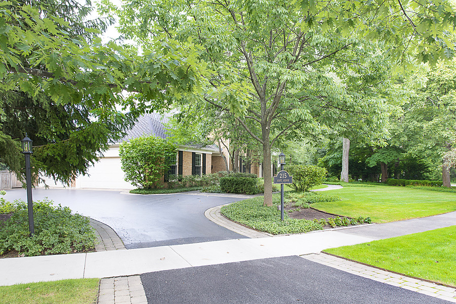 Undisclosed Address Winnetka, IL 60093 - Photo 51 of 55 a view of a house with a yard