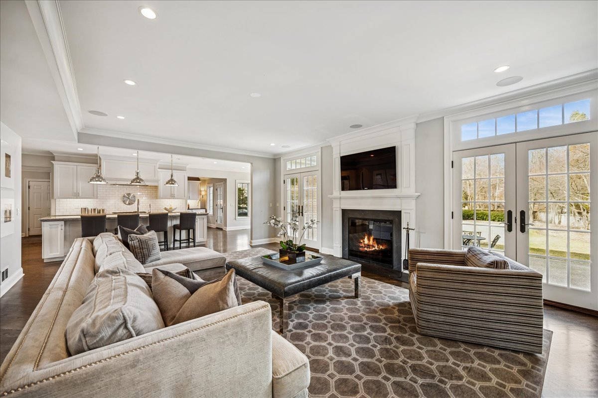 Undisclosed Address Winnetka, IL 60093 - Photo 8 of 55 a living room with furniture fireplace and a large window