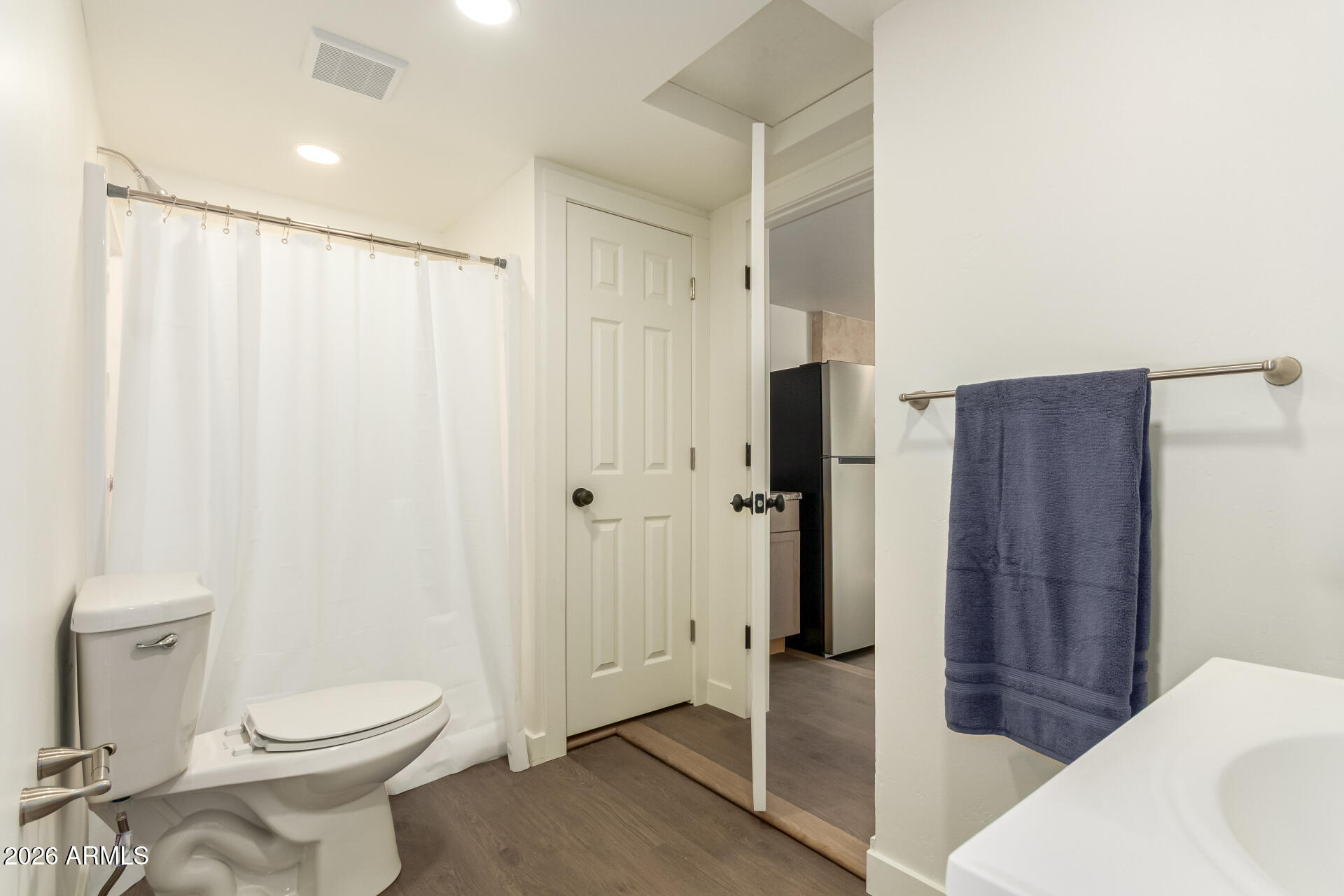 7819 North 17th Avenue Phoenix, AZ 85021 - Photo 29 of 31 a bathroom with a toilet and a shower
