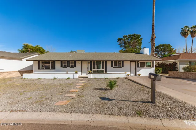 front view of a house with a street