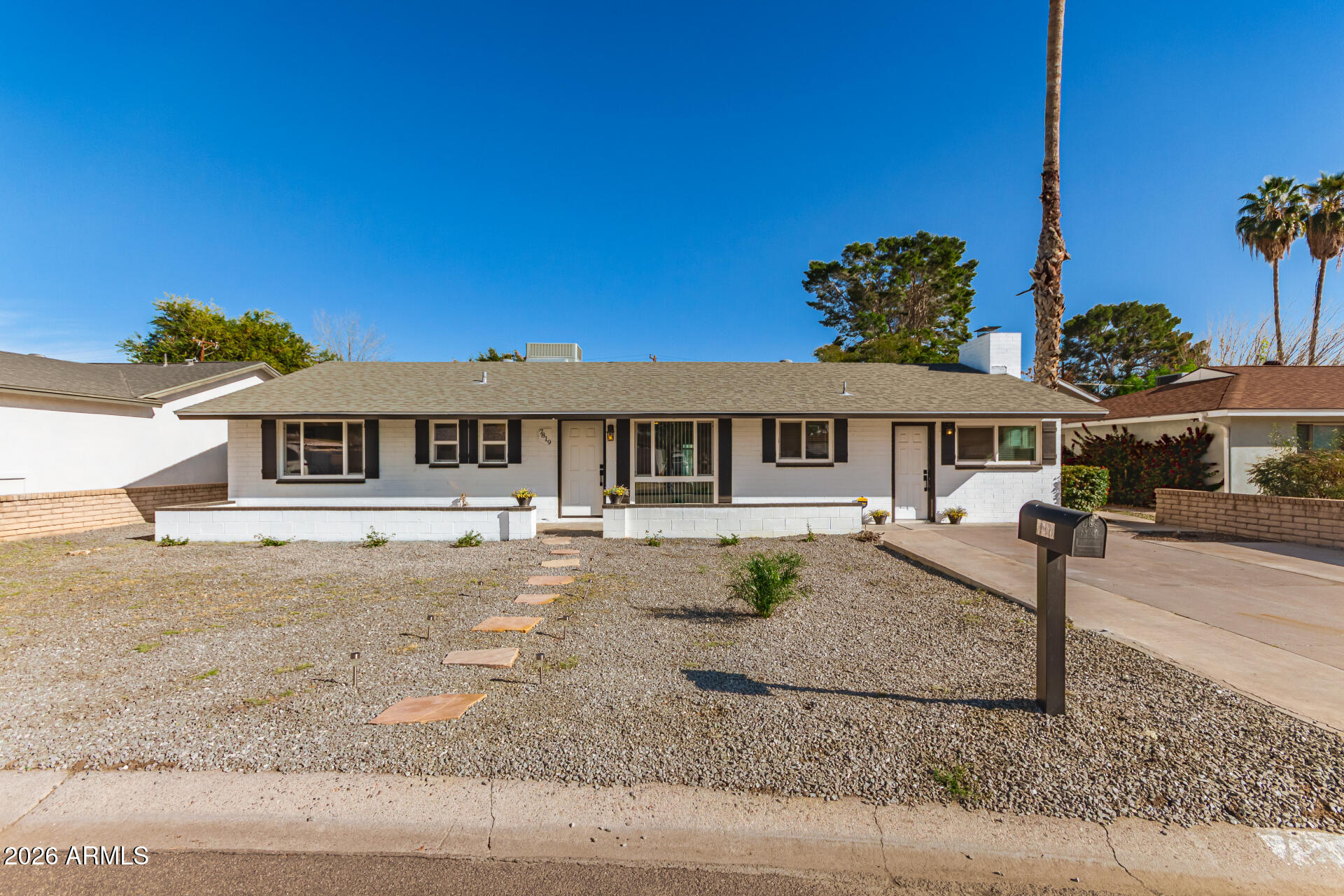 7819 North 17th Avenue Phoenix, AZ 85021 - Photo 6 of 31 front view of a house with a street