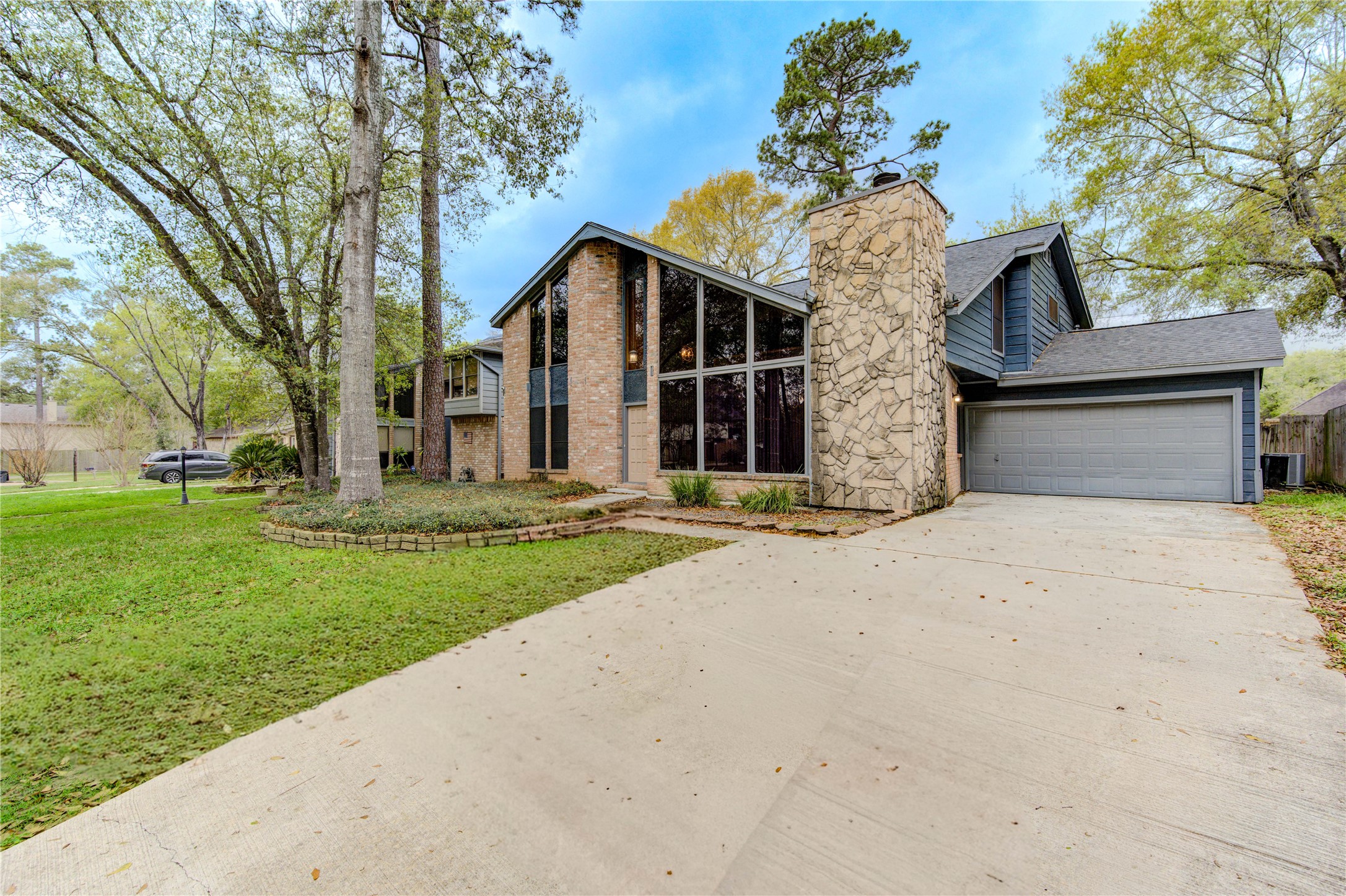 530 Enchanted Lane Spring, TX 77388 - Photo 2 of 26 front view of a house with a yard